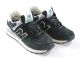 Chaussure new balance  ml 574 en daim et textile noir caviar.